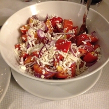 Nonna salad - tomatos, onion, and salted ricotta cheese